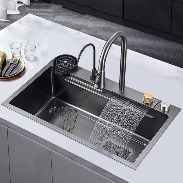 This shows a beautiful kitchen sink with many innovative features to make cleaning easier.